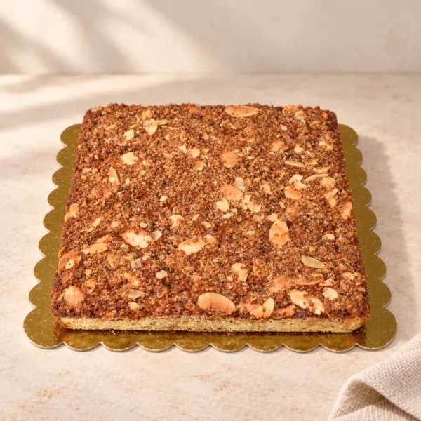 Cinnamon apple cake topped with almonds